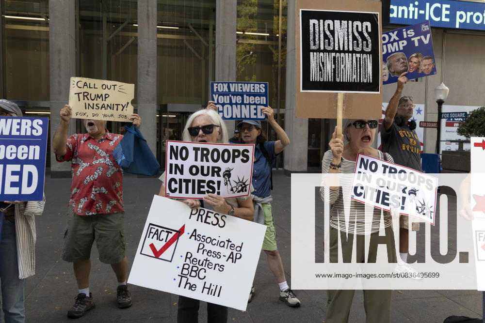 Demonstrators denouncing Fox News as extremist right-wing propaganda in support of President Trump s administration hold signs that read NO TROOPS IN OUR CITIES! with an image of the Statue of Liberty PRESS FACT check Associated Press AP Reuters BBC The Hill DISMISS MISINFORMATION CALL OUT TRUMP INSANITY! FOX, DO YOUR JOB. FOX VIEWERS You ve been CONNED outside of News Corp s Fox News Channel in midtown Manhattan. Protesters with the activist groups Rise & Resist and Truth Tuesdays come to Fox News weekly for a peaceful demonstration calling for truth in journalism and denouncing authoritarianism, oligarchy, fascism, and Trump s agenda. New York USA - ZUMAr174 20251007_znp_r174_003