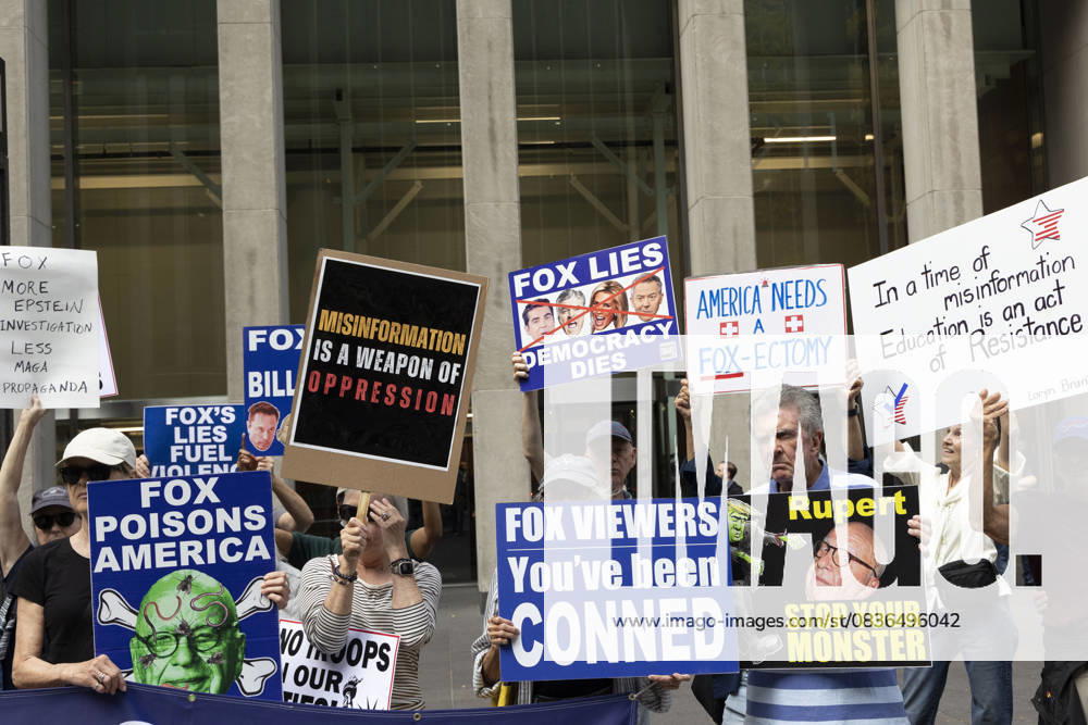 Demonstrators denouncing Fox News as extremist right-wing propaganda in support of President Trump s administration hold signs that read FOX POISONS AMERICA with an image of owner R. Murdoch with green skin, crossbones, worms and flies on his face MISINFORMATION IS A WEAPON OF OPPRESSION FOX VIEWERS You ve been CONNED Rupert STOP YOUR MONSTER FOX LIES DEMOCRACY DIES with images of Fox anchors J. Watters, S. Hannity, L. Ingraham and G. Gutfeld crossed out FOX MORE EPSTEIN INVESTIGATION LESS MAGA PROPAGANDA AMERICAN NEEDS A FOX-ECTOMY In a time of misinformation Education is an act of Resistance outside of News Corp s Fox News Channel in midtown Manhattan. Protesters with the activist - ZUMAr174 20251007_znp_r174_028
