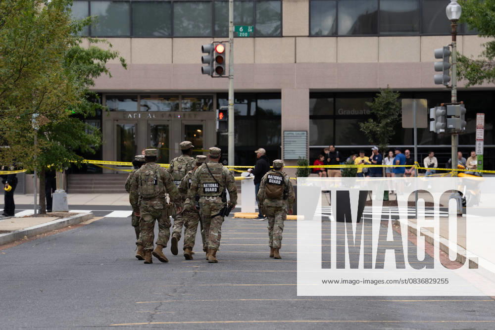 A National Guard unit arrives at the crime scene after a teenager was shot in Southwest Washington, D.C. near the Air and Space Museum on October 10, 2025. The victim was transported to the hospital with non-life threatening conditions. Washington United States - ZUMAl312 20251010_znp_l312_028