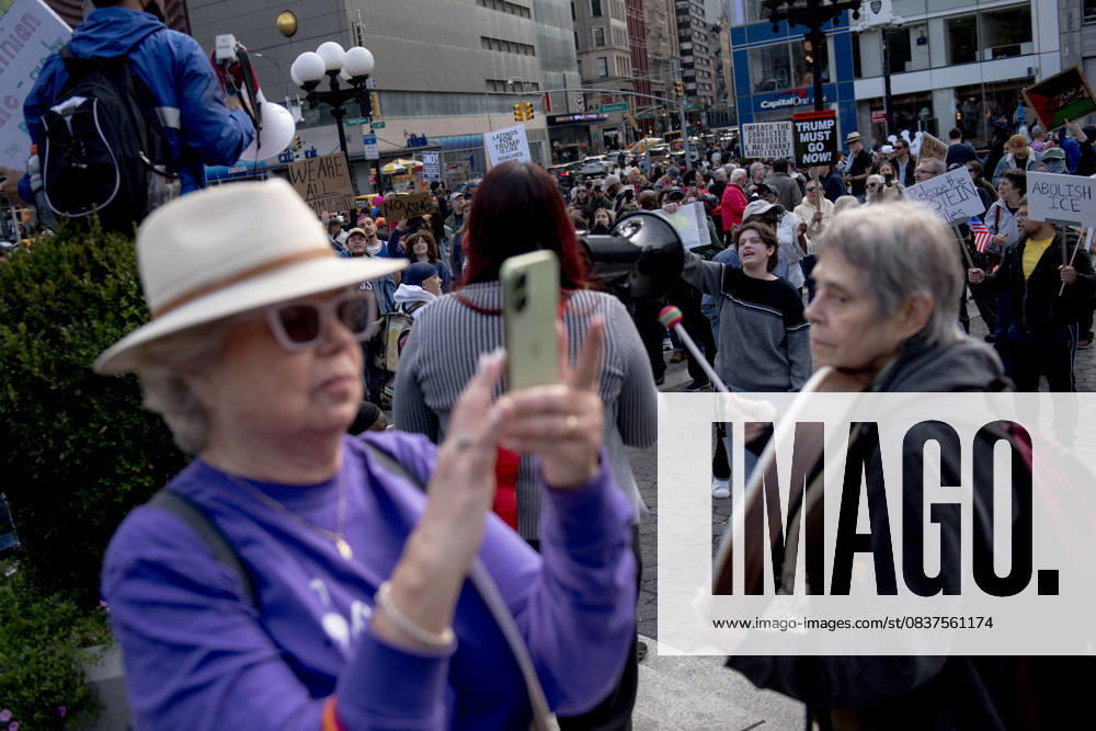 Protesters march down Broadway during the Ã¢â‚¬oeNo KingsÃ¢â‚¬Â rally in New York, Saturday, Oct. 18, 2025. The demonstration began in Times Square and ended in Union Square, drawing an estimated 50,000 people who joined others across the country calling for the protection of democratic institutions and denouncing authoritarian leadership. Organizers said more than 5 million people participated in over 2,000 marches nationwide. New York USA - ZUMAa306 20251018_znp_a306_002