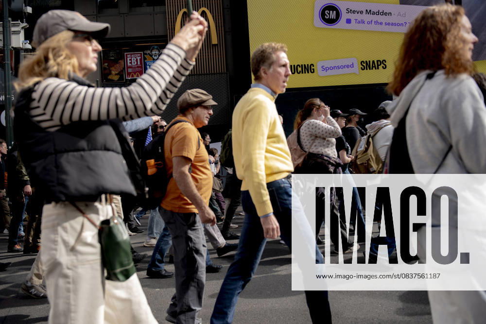 Protesters march down Broadway during the Ã¢â‚¬oeNo KingsÃ¢â‚¬Â rally in New York, Saturday, Oct. 18, 2025. The demonstration began in Times Square and ended in Union Square, drawing an estimated 50,000 people who joined others across the country calling for the protection of democratic institutions and denouncing authoritarian leadership. Organizers said more than 5 million people participated in over 2,000 marches nationwide. New York USA - ZUMAa306 20251018_znp_a306_008