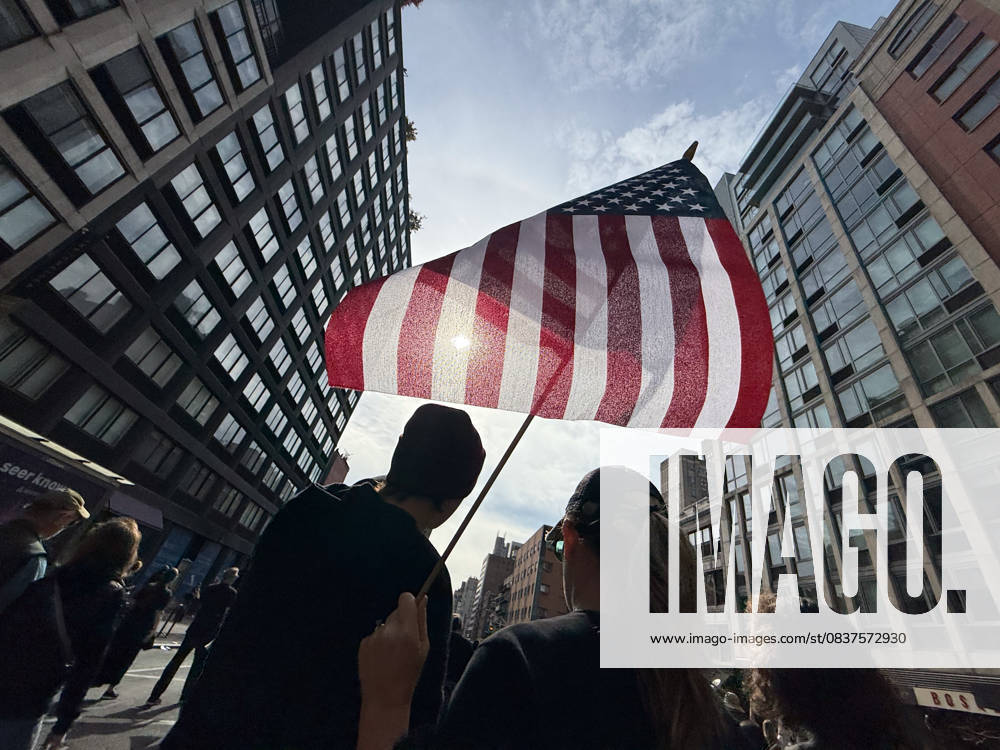 Protesters march in the No Kings Protest against the Trump administration down Seventh Avenue in Chelsea on October 18, 2025 in New York. New York USA - ZUMAb148 20251018_zap_b148_002