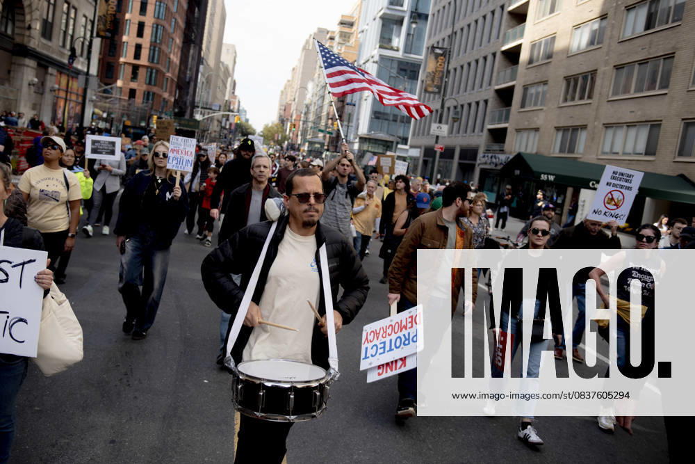 Protesters march down Broadway during the Ã¢â‚¬oeNo KingsÃ¢â‚¬Â rally in New York, Saturday, Oct. 18, 2025. The demonstration began in Times Square and ended in Union Square, drawing an estimated 50,000 people who joined others across the country calling for the protection of democratic institutions and denouncing authoritarian leadership. Organizers said more than 5 million people participated in over 2,000 marches nationwide. New York USA - ZUMAa306 20251018_znp_a306_001