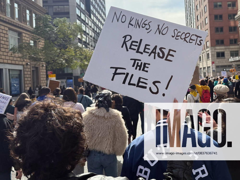 Protesters march in the No Kings Protest against the Trump administration down Seventh Avenue in Chelsea on October 18, 2025 in New York. New York USA - ZUMAb148 20251018_zap_b148_004