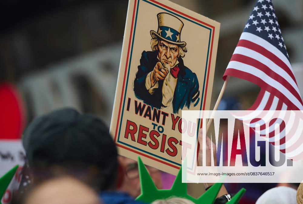 Protester holds sign of Uncle Sam that reads, â€oeI want you to resist†in the New York City No Kings protest in opposition to measures Donald Trump has taken to install authoritarian style rule. New York USA - ZUMAl171 20251018_znp_l171_036