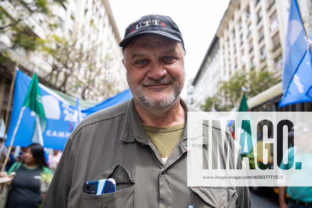 Farmer from the Union of Land Workers poses for the camera during the march to Plaza de Mayo, fresh food becomes both protest and offering amid a production and consumption crisis. Buenos Aires Argentina - ZUMAp265 20251016_zip_p265_003