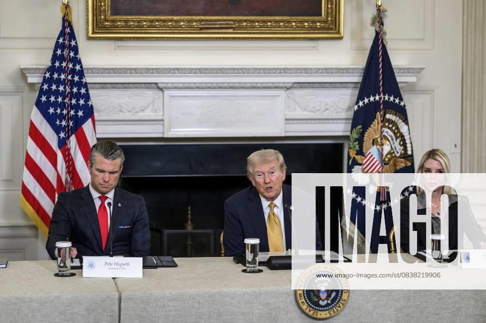 U.S. President Donald Trump, center, delivers remarks during a roundtable event launching the Homeland Security Task Force at the State Dining Room of the White House, October 23, 2025 in Washington, D.C. Sitting from left: Secretary of Defense Pete Hegseth, Trump, and Attorney General Pam Bondi. Washington United States of America - ZUMAp138 20251023_zaa_p138_001