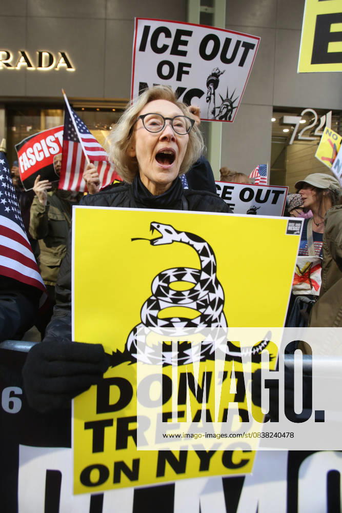 A woman holds a sign that says Don t Tread on NYC during a Hands Off NYC rally outside of Trump Tower on October 25, 2025. Some women wore polka dots in honor of a protestor who confronted ICE agents and tank vehicles. The peaceful rally drew a handful of Trump supporters. New York City USA - ZUMAk45_ 20251025_zaf_k45_016