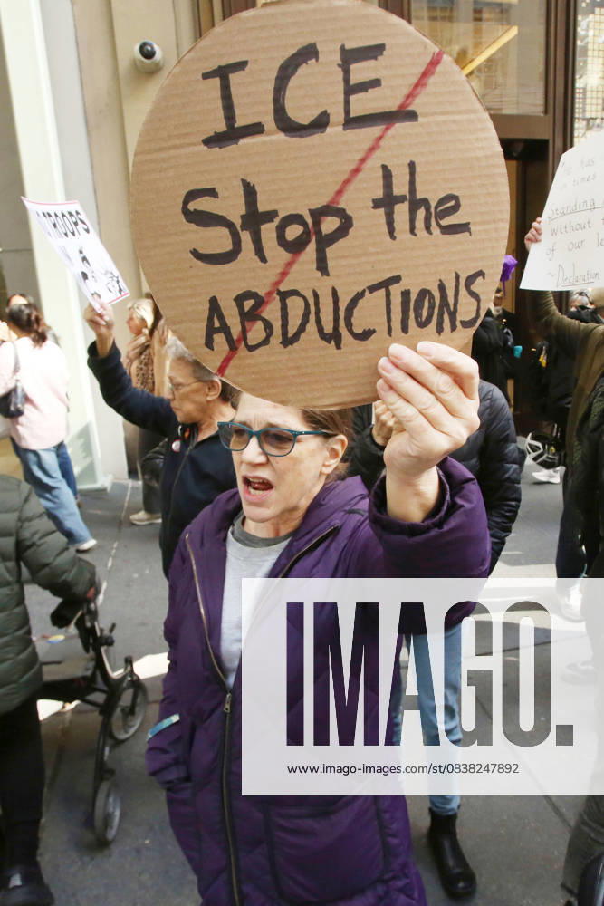 A woman holds a sign that says ICE, Stop the Abductions during a Hands Off NYC rally outside of Trump Tower on October 25, 2025. Some women wore polka dots in honor of a protestor who confronted ICE agents and tank vehicles. The peaceful rally drew a handful of Trump supporters. New York City USA - ZUMAk45_ 20251025_zaf_k45_035