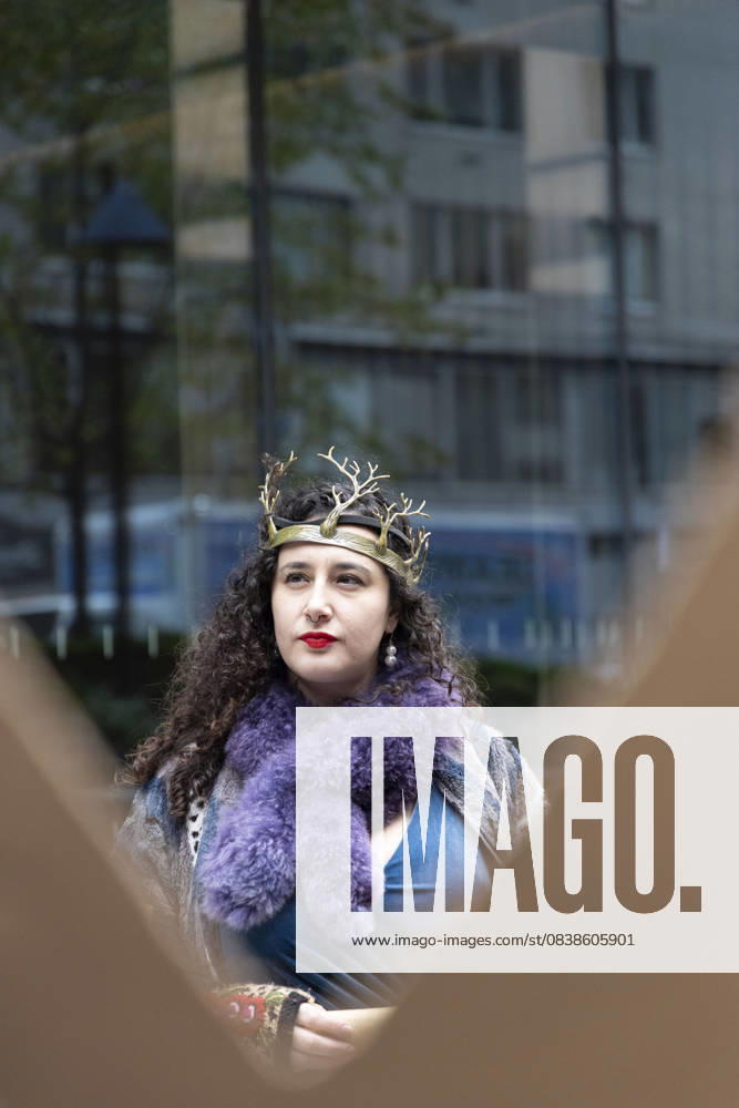 A demonstrator wearing a crown dresses up as Queen Governor Hochul while others hold crown shaped signs at a rally and picket against the Governor s recent climate policy announcement outside Hochul s New York City office in Midtown Manhattan. Climate activists say President Trump isn t a king and Governor Hochul isn t a Queen after she announced plans to delay the implementation of a state law set to begin January 1st that ends gas use in new construction. Demonstrators also denounce what they call the Governor s lurch to Trumpism for fast tracking the permitting for a fracked gas pipeline. The peaceful protest is organized by New York Communities For Change, Food and Water Watch NY and NYPIRG - ZUMAr174 20251028_znp_r174_004