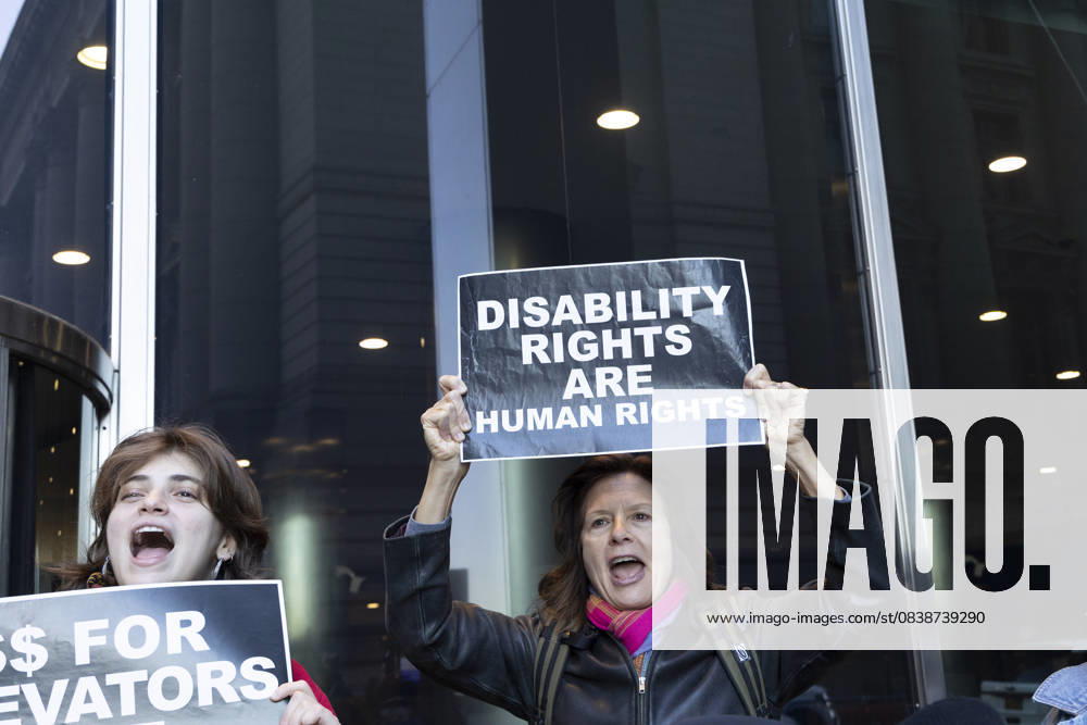 Demonstrators calling for public transit accessibility via working elevators outside MTA (The Metropolitan Transportation Authority) headquarters in Lower Manhattan chant holding banners and signs that read DISABILITY RIGHTS ARE HUMAN RIGHTS. Members of the Rise and Resist Elevator Action Group, Disabled In Action of Metropolitan New York, Brooklyn Center for Independence.of the Disabled, ADAPT and supporters demand that the MTA settle an elevator maintenance court case, maintain the existing subway elevators, which breakdown regularly, and invest in accessible stations. New York USA - ZUMAr174 20251027_znp_r174_023