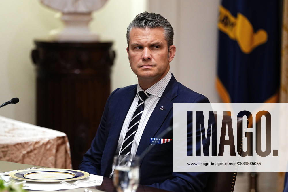 United States Secretary of War Pete Hegseth looks on as Prime Minister of Hungary Viktor Orban (not pictured) speaks to US President Donald J Trump during a bilateral lunch in the Cabinet Room of the White House in Washington, DC, USA, on Friday