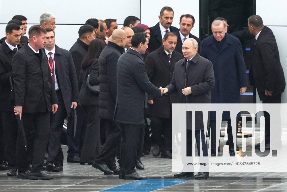 Turkmenistan Russia 9069861 12.12.2025 Russian President Vladimir Putin is welcomed by Turkmen President Serdar Berdimuhamedov alongside Turkish President Recep Tayyip Erdogan before a wreath-laying ceremony at the Turkmenistan Neutrality Monument in Ashgabat, Turkmenistan. Alexander Shcherbak Sputnik Ashgabat Turkmenistan