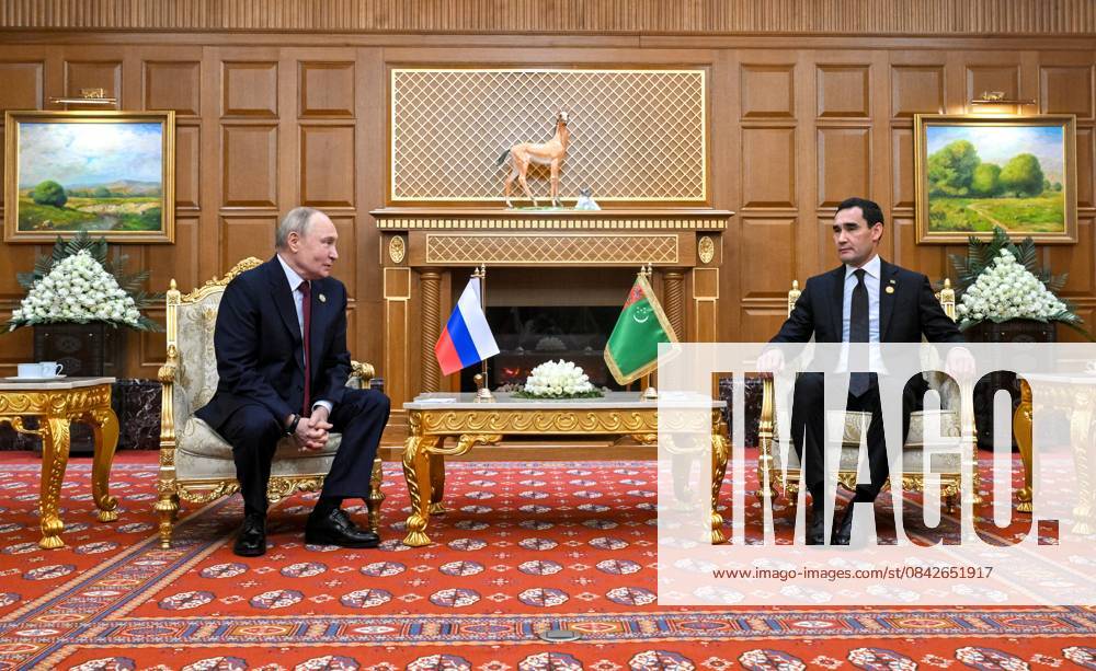 Turkmenistan Russia 9069944 12.12.2025 Russian President Vladimir Putin and Turkmen President Serdar Berdimuhamedov shake hands as they pose for photos before a meeting in Ashgabat, Turkmenistan. Kristina Kormilitsyna Sputnik Ashgabat Turkmenistan