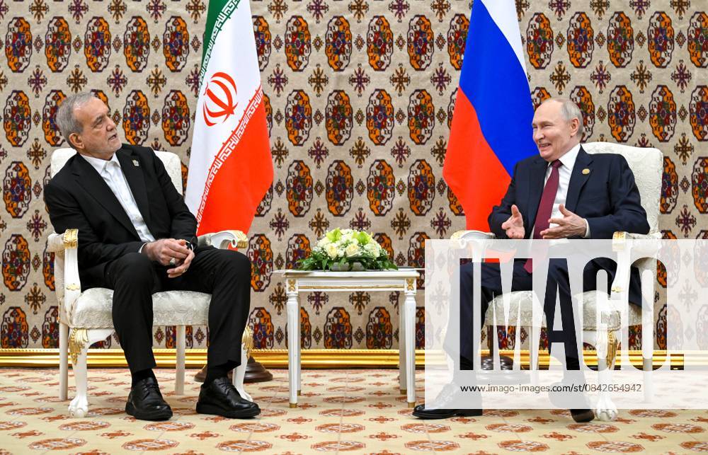 Turkmenistan Russia 9069971 12.12.2025 Iranian President Masoud Pezeshkian and Russian President Vladimir Putin attend a meeting in Ashgabat, Turkmenistan. Kristina Kormilitsyna Sputnik Ashgabat Turkmenistan