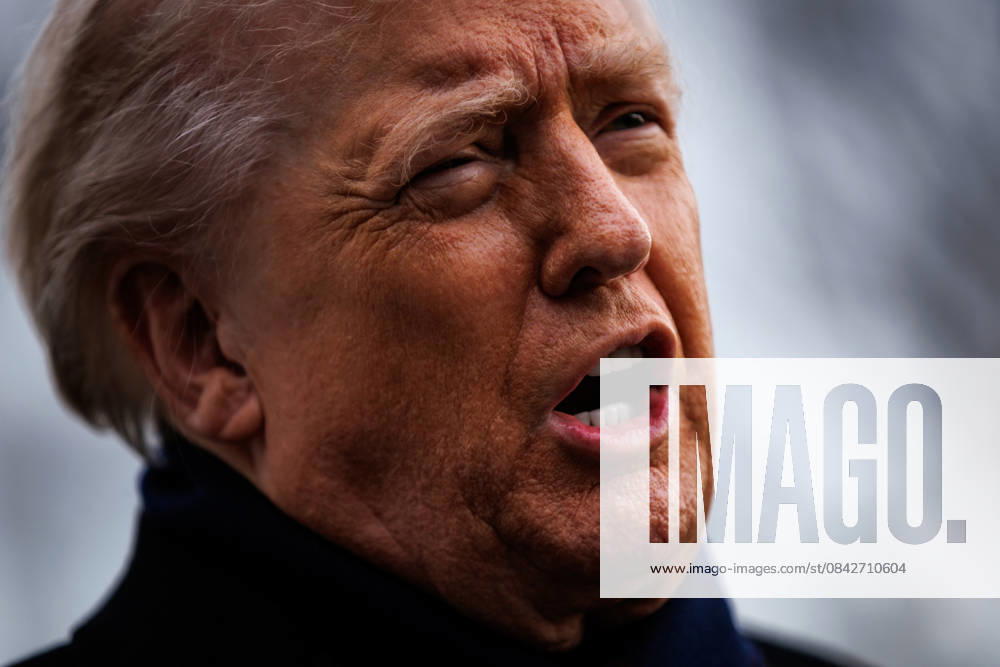 President Donald Trump speaks with reporters before departing from the South Lawn in Marine One in Washington, DC on Saturday, December 13, 2025.The President is heading to Baltimore, Maryland, where he will be attending the Army - Navy football game at M&T Bank Stadium. WASP20251213103 SamuelxCorum