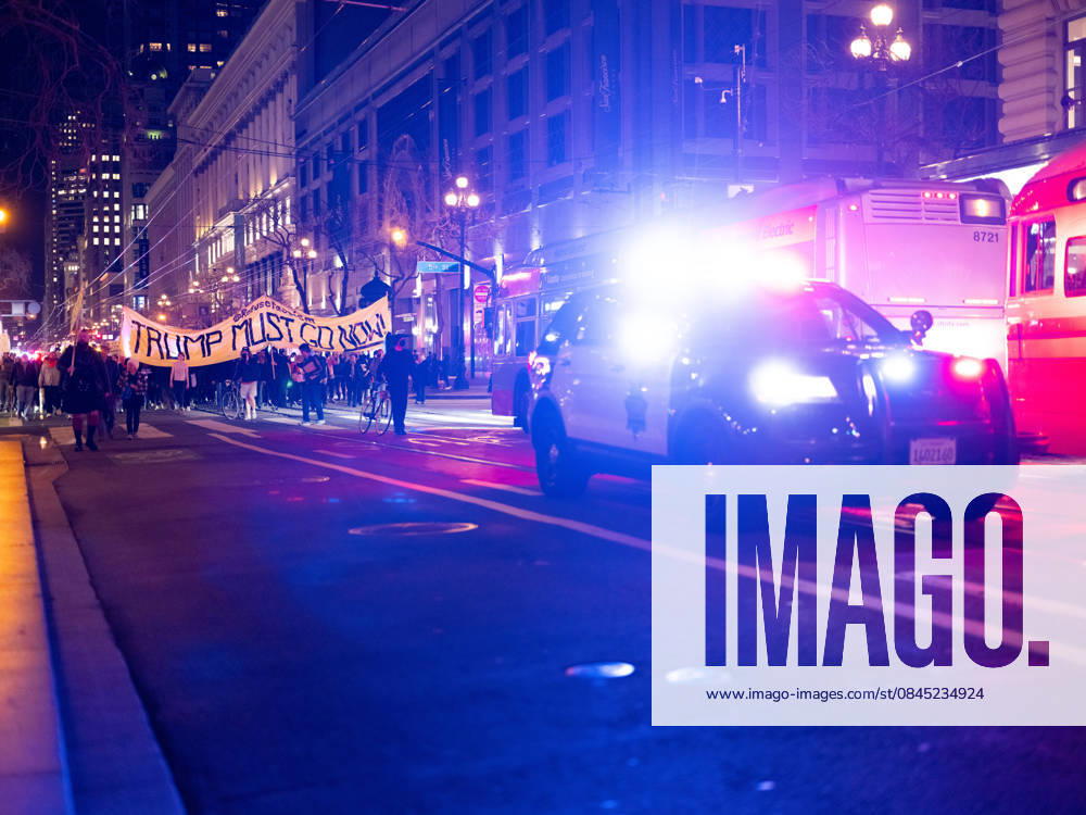 A San Francisco Police cruiser escorts a rally and march against the Immigration and Customs Enforcement (ICE) killing of U.S. citizen Renee Nicole Good in San Francisco on Wednesday, Jan. 7, 2026. An officer shot and killed Good during an immigration enforcement action. San Francisco USA - ZUMAk157 20260107_znp_k157_010