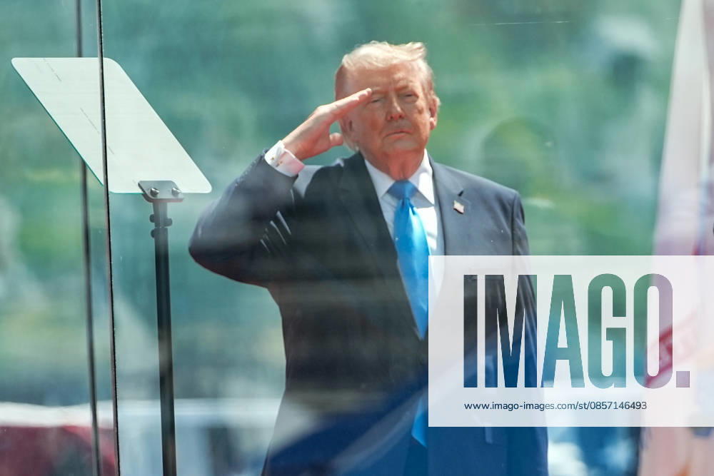 President Donald Trump salutes during the National Anthem before delivering the commencement address at the United States Coast Guard Academy s graduation ceremony in New London, Connecticut on Wednesday, May 20, 2026. CONN20260520434 ANGELINAxKATSANIS