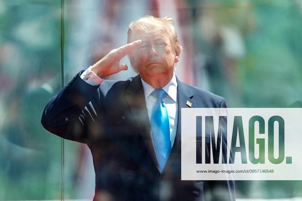 President Donald Trump salutes during the National Anthem before delivering the commencement address at the United States Coast Guard Academy s graduation ceremony in New London, Connecticut on Wednesday, May 20, 2026. CONN20260520435 ANGELINAxKATSANIS
