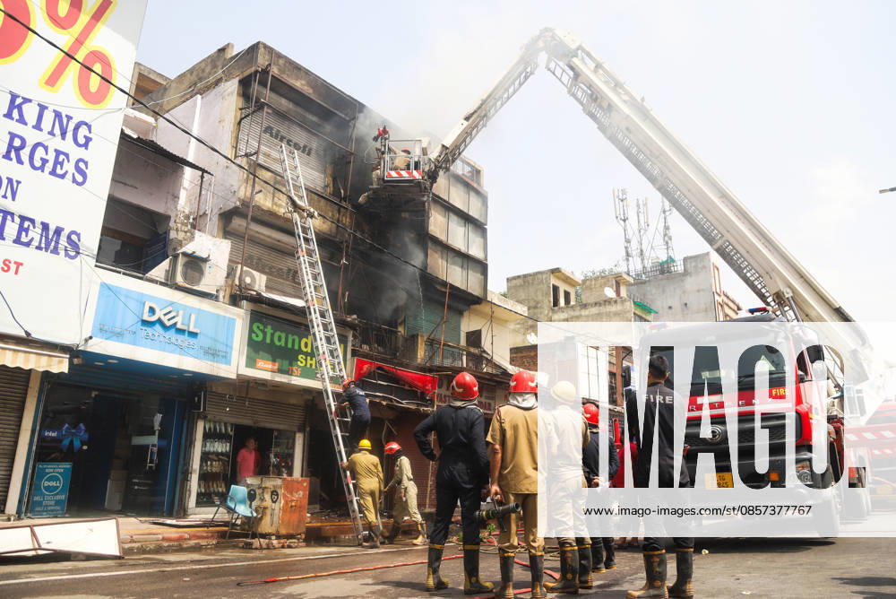 Firefighting operations underway after fire breaks out at a commercial building in Kingsway Camp near GTB Nagar metro station New Delhi, May 23 (ANI): Firefighting operations underway after fire breaks out at a commercial building in Kingsway Camp near GTB Nagar metro station, in New Delhi on Saturday. New Delhi Delhi India