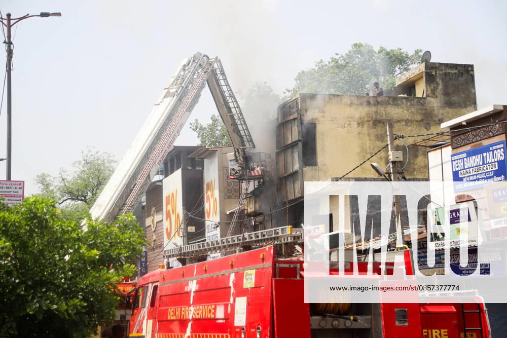 Firefighting operations underway after fire breaks out at a commercial building in Kingsway Camp near GTB Nagar metro station New Delhi, May 23 (ANI): Firefighting operations underway after fire breaks out at a commercial building in Kingsway Camp near GTB Nagar metro station, in New Delhi on Saturday. New Delhi Delhi India
