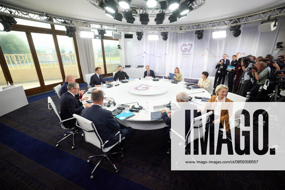 German Chancellor Friedrich Merz, British Prime Minister Kier Starmer, United States President Donald J. Trump, French President Emmanuel Macron, Ukrainian President Volodymyr Zelenskyy, Canadian Prime Minister Mark Carney, Italian President Giorgia Meloni, Japanese Prime Minister Sanae Takaichi, European Commission President Ursula von der Leyen, and European Council President Antonio Costa participate in a round table discussion at the G7 Summit in Evian, France, on Tuesday, June 16, 2026. Photo via Ukrainian Presidential Press Office WAX2026061603 UKRAINIANxPRESIDENTIALxPRESSxOFFICE