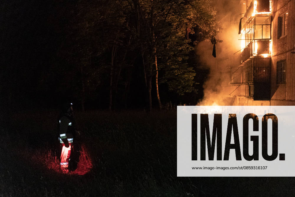 Ukrainian firefighters battle blaze after Russian drone strike in Druzhkivka DRUZHKIVKA, UKRAINE - JUNE 17: A Ukrainian firefighter stands near a residential building on fire following a Russian drone attack in Druzhkivka, Ukraine, on June 17, 2026. Diego Herrera Carcedo Anadolu Ukraine Donetsk. Editorial use only. Please get in touch for any other usage.
