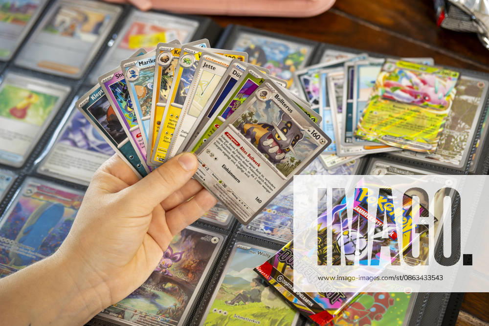 Germany, Bavaria, Pokémon Trading Cards, a teenage girl enthusiastically collects Pokémon cards in her album August 5, 2026, Pokémon August 5, 2026, Pokémon