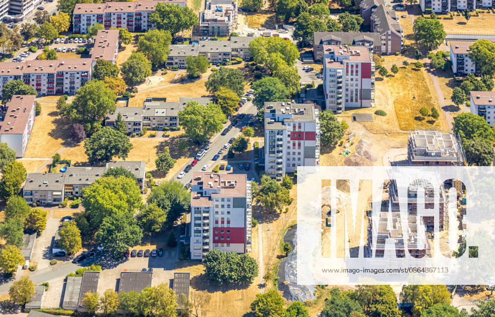 Aerial view, construction site, and new high-rise apartment buildings in the Baßfeldshof and Am Stadtbad residential complexes, Bruch, Dinslaken, Ruhr region, North Rhine-Westphalia, Germany ATTENTION: MINIMUM FEE: 60 EURO