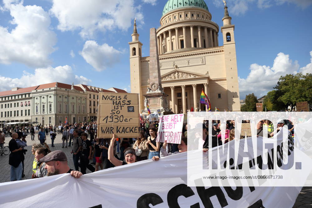Protesters carrying a banner reading Review today, ban tomorrow march around the state parliament during a demonstration calling for the Federal Constitutional Court to review far-right parties, Alter Markt, Potsdam, September 12, 2026. Review demonstration in Potsdam