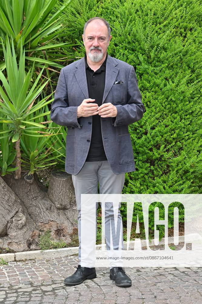 IPA88634654 - Rome: Rai Studios on Via Teulada. Photocall for the show *Misteri dimenticati*—*Blu notte* with Carlo Lucarelli. Pictured: Carlo Lucarelli