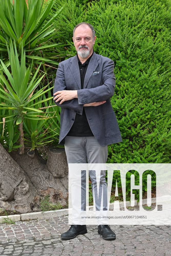 IPA88634668 - Rome: Rai Studios on Via Teulada. Photocall for the show *Misteri dimenticati*—*Blu notte* with Carlo Lucarelli. Pictured: Carlo Lucarelli