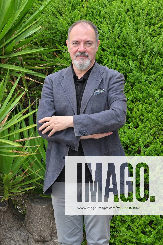 IPA88634670 - Rome: Rai Studios on Via Teulada. Photocall for the show *Misteri dimenticati*—*Blu notte* with Carlo Lucarelli. Pictured: Carlo Lucarelli