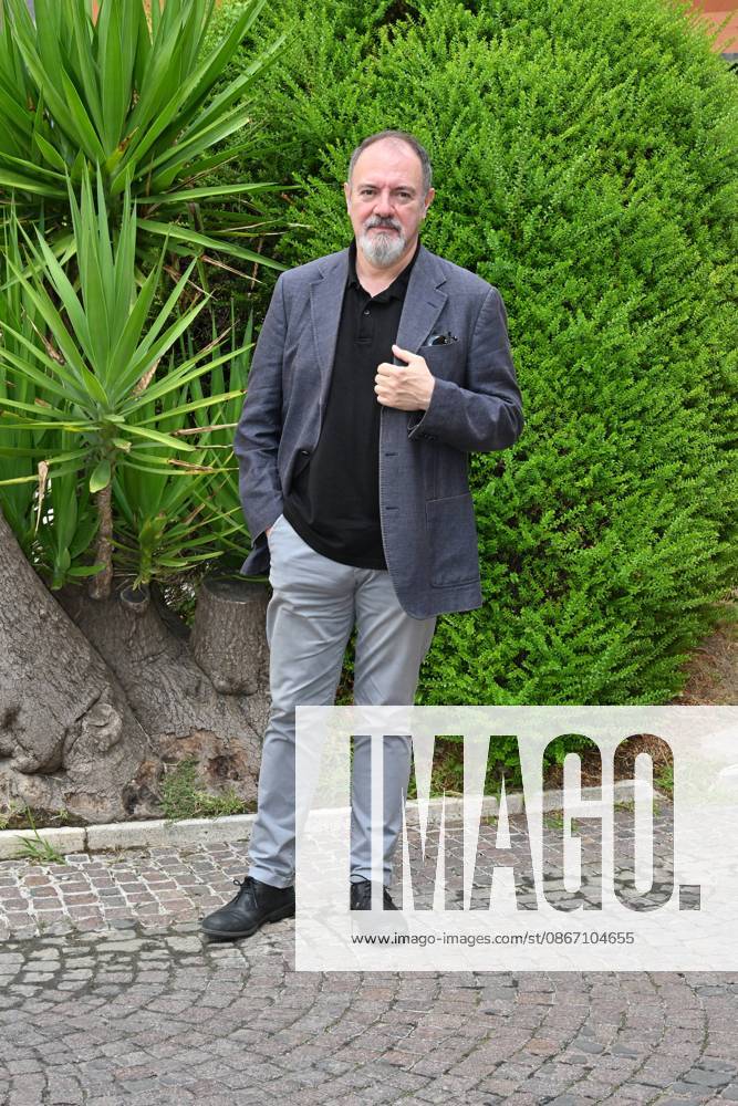 IPA88634678 - Rome: Rai Studios on Via Teulada. Photocall for the show *Misteri dimenticati*—*Blu notte* with Carlo Lucarelli. Pictured: Carlo Lucarelli