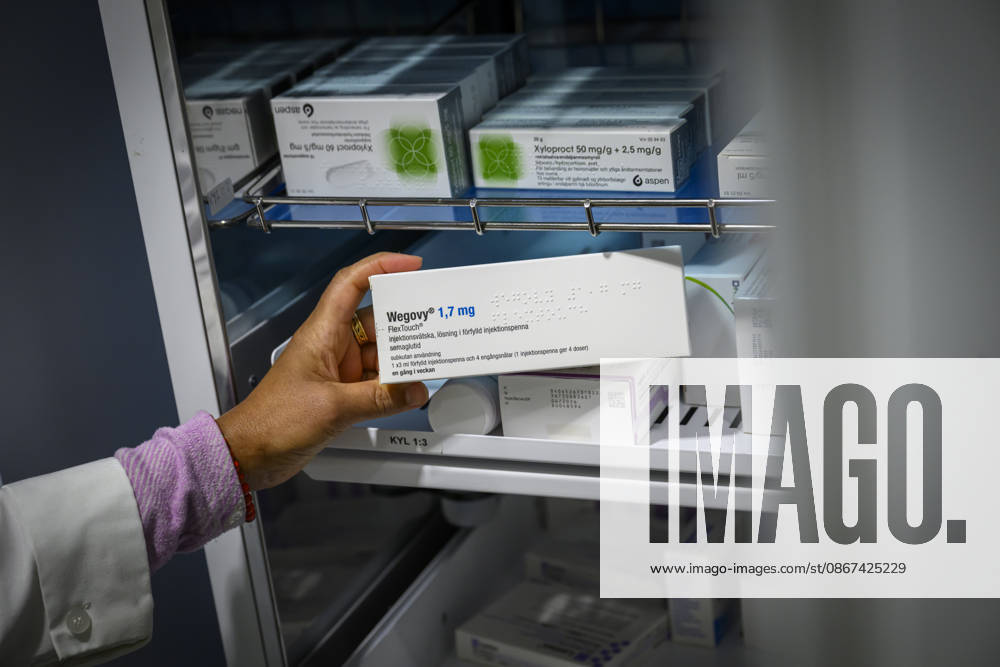 Medications at Apoteket Hjärtat Lindhagen: Pharmacy staff are retrieving a refrigerated injectable medication from the pharmacy’s