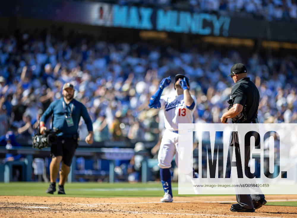 Max Muncy of the Los Angeles Dodgers reacts after hitting a solo home run during the game against the Atlanta Braves in game one of the National League Division Series at Dodger Stadium on October 03, 2026 in Los Angeles, California. Los Angeles Dodgers won the game 5-3. . Los Angeles USA - ZUMAa60_ 20261003_zaf_a60_024
