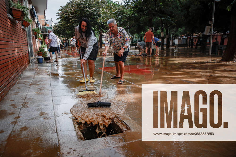 The Besòs River Exceeds the Danger Threshold in Santa Coloma de Gramenet, Barcelona. Residents clean up the mud that has accumulated in the streets due to last night’s torrential rains, on October 4, 2026, in Sant Adrià de Besòs, Barcelona, Catalonia, Spain. The Generalitat’s Civil Protection Agency has issued an Es Alert to residents of Barcelona, Montcada i Reixac, Santa Coloma de Gramenet, and Sant Adrià de Besòs, Barcelona, due to the risk of the Besòs River overflowing as a result of the rainstorm. Civil Protection has asked nearby residents to go to upper floors if water reaches their homes. They also remind residents to avoid basements and ground floors and to stay away from the river OCTOBER 4, 2026 Kike Rincó Sant Adrià de Besòs