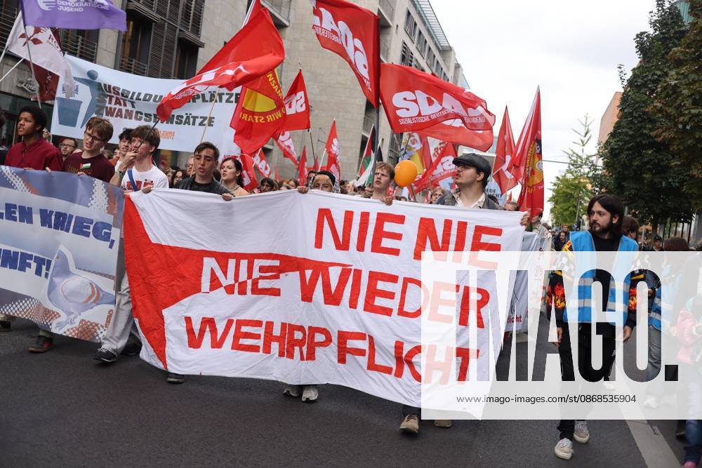 BERLIN, GERMANY, OCTOBER 3, 2026: Thousands of demonstrators march through central Berlin during a protest against Germany s military buildup, increased defense spending and the possible reintroduction of compulsory military service. Protesters called for greater investment in healthcare, housing, education and other social services instead of military spending, while participants also demonstrated against German arms deliveries and support for Israel amid the war in Gaza. The march began at the Brandenburg Gate and continued through central Berlin before returning to the area. Berlin Germany - ZUMAq101 20261003_zna_q101_214