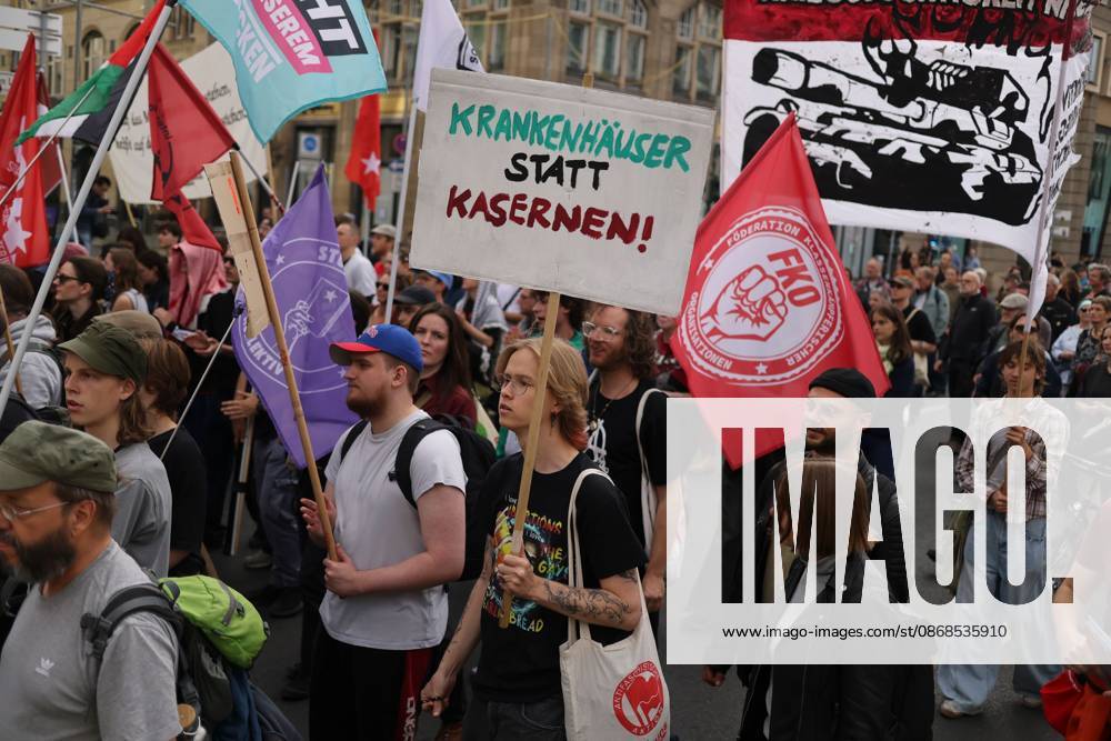 BERLIN, GERMANY, OCTOBER 3, 2026: Thousands of demonstrators march through central Berlin during a protest against Germany s military buildup, increased defense spending and the possible reintroduction of compulsory military service. Protesters called for greater investment in healthcare, housing, education and other social services instead of military spending, while participants also demonstrated against German arms deliveries and support for Israel amid the war in Gaza. The march began at the Brandenburg Gate and continued through central Berlin before returning to the area. Berlin Germany - ZUMAq101 20261003_zna_q101_215
