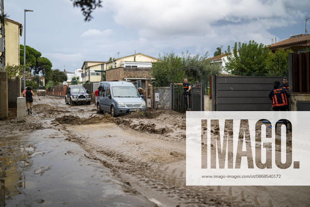 Heavy rains in Catalonia leave two dead and the Besòs River at risk of flooding. Residents clean up the mud that has accumulated in the streets and homes due to the torrential rains, on October 4, 2026, in Montornès del Vallès, Barcelona, Catalonia, Spain. The storm hitting Catalonia has left two people dead in the region. The president of the Generalitat, Salvador Illa, reported the death in Tordera of a 75-year-old man, who was at a campground when a wall reportedly collapsed on him. The second victim is a person who had been reported missing and was found in Montornès del Vallès. Emergency services are searching for another missing person in Riera de Pineda de Mar. The rains and storms have put eleven autonomous communities on alert thi