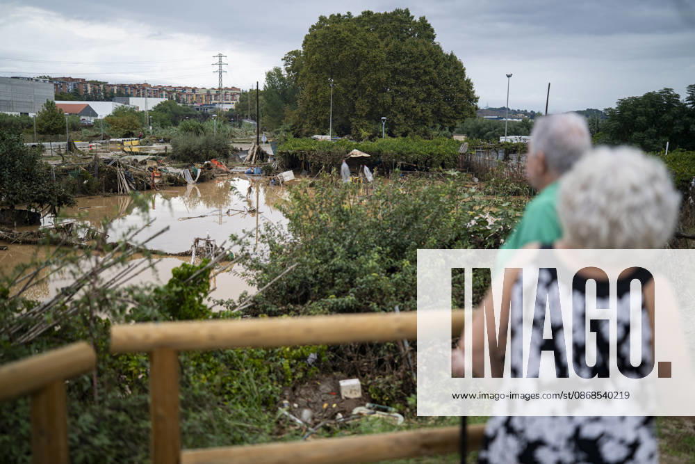 Heavy rains in Catalonia leave two dead and the Besòs River at risk of flooding Two people look at the mud and standing water caused by the torrential rains on October 4, 2026, in Montornès del Vallès, Barcelona, Catalonia, Spain. The storm hitting Catalonia has left two people dead in the region. The president of the Generalitat, Salvador Illa, reported the death in Tordera of a 75-year-old man, who was at a campground when a wall reportedly collapsed on him. The second victim is a person who had been reported missing and was found in Montornès del Vallès. Emergency services are searching for another missing person in Riera de Pineda de Mar. The rains and storms have put eleven autonomous communities on alert this Sunday in Spain, includi