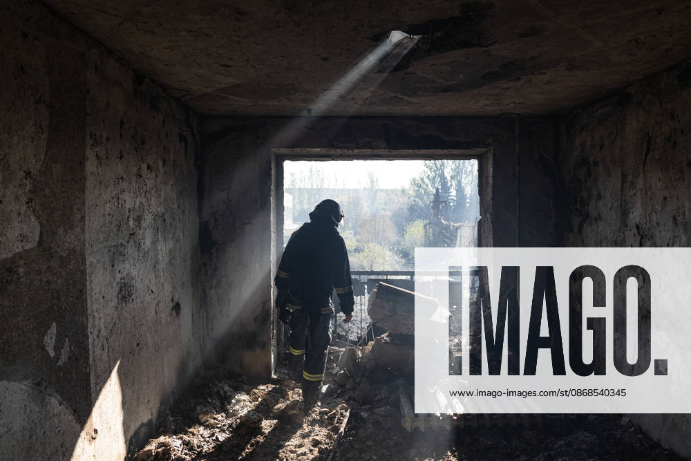 Aftermath of Russian attack on Ukraine s Kramatorsk KRAMATORSK, UKRAINE - OCTOBER 4: A Ukrainian firefighter inspects a burnt-out flat in a building that has been burnt and damaged following several Russian attacks on a residential area in Kramatorsk, Ukraine, 4 October 2026 Diego Herrera Carcedo Anadolu Kramatorsk Ukraine. Editorial use only. Please get in touch for any other usage.