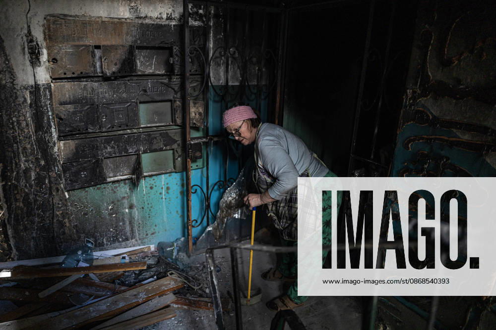 Aftermath of Russian attack on Ukraine s Kramatorsk KRAMATORSK, UKRAINE - OCTOBER 4: A woman clears rubble following several Russian attacks on a residential building in Kramatorsk, Ukraine, 4 October 2026 Diego Herrera Carcedo Anadolu Kramatorsk Ukraine. Editorial use only. Please get in touch for any other usage.