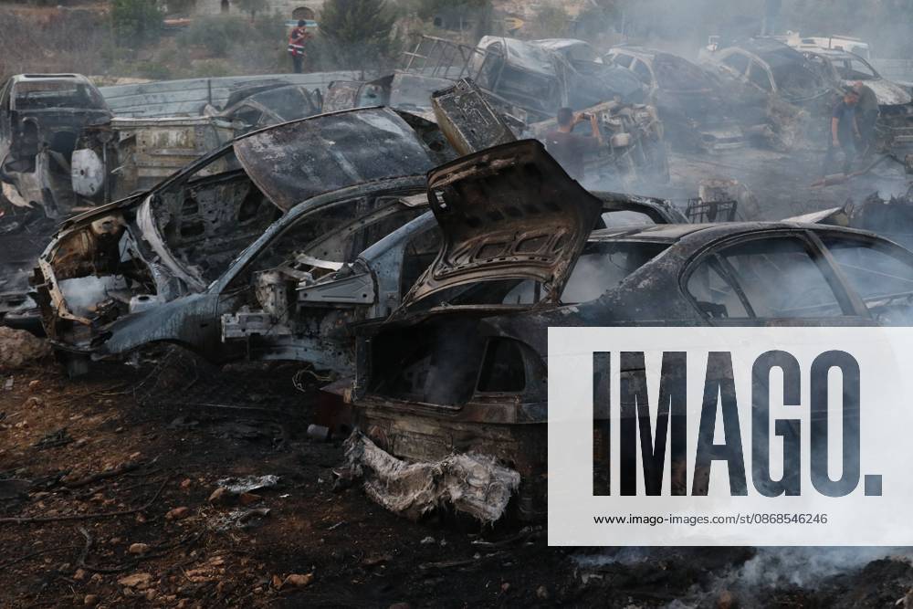 Israeli Settlers Set Fire To Olive Trees And Car Scrap Yard Near Silwad SILWAD, WEST BANK, PALESTINE OCTOBER 4, 2026: Israeli settlers set fire to olive trees and a car scrap yard between the villages of Ein Yabrud and Silwad, according to the information provided. The owner of the repair shop said more than 50 cars were destroyed in the fire. The incident occurred amid ongoing attacks targeting Palestinian property and agricultural land in the area. Fires affecting olive trees and other Palestinian property have also been reported in areas around Silwad. Ramallah Palestine, State of