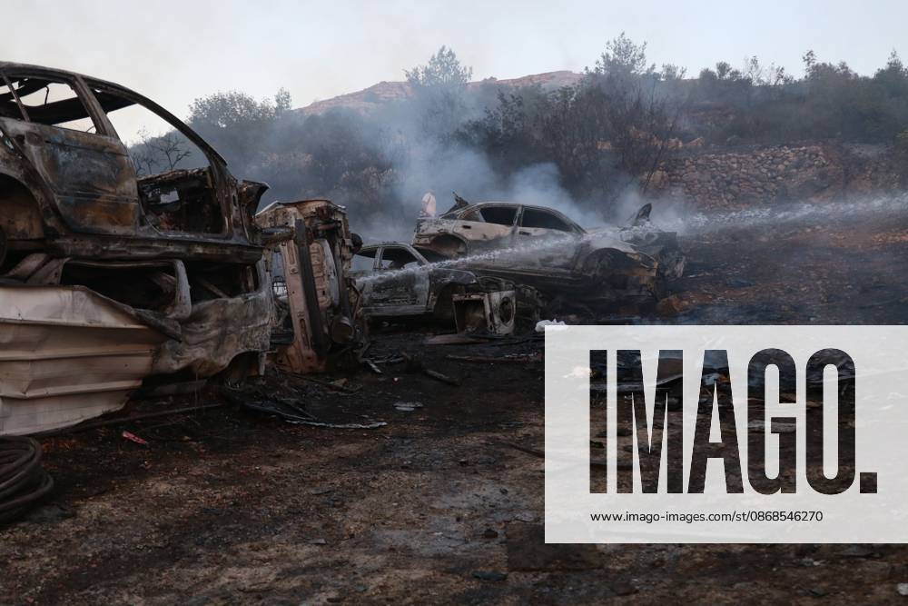 Israeli Settlers Set Fire To Olive Trees And Car Scrap Yard Near Silwad SILWAD, WEST BANK, PALESTINE OCTOBER 4, 2026: Israeli settlers set fire to olive trees and a car scrap yard between the villages of Ein Yabrud and Silwad, according to the information provided. The owner of the repair shop said more than 50 cars were destroyed in the fire. The incident occurred amid ongoing attacks targeting Palestinian property and agricultural land in the area. Fires affecting olive trees and other Palestinian property have also been reported in areas around Silwad. Ramallah Palestine, State of