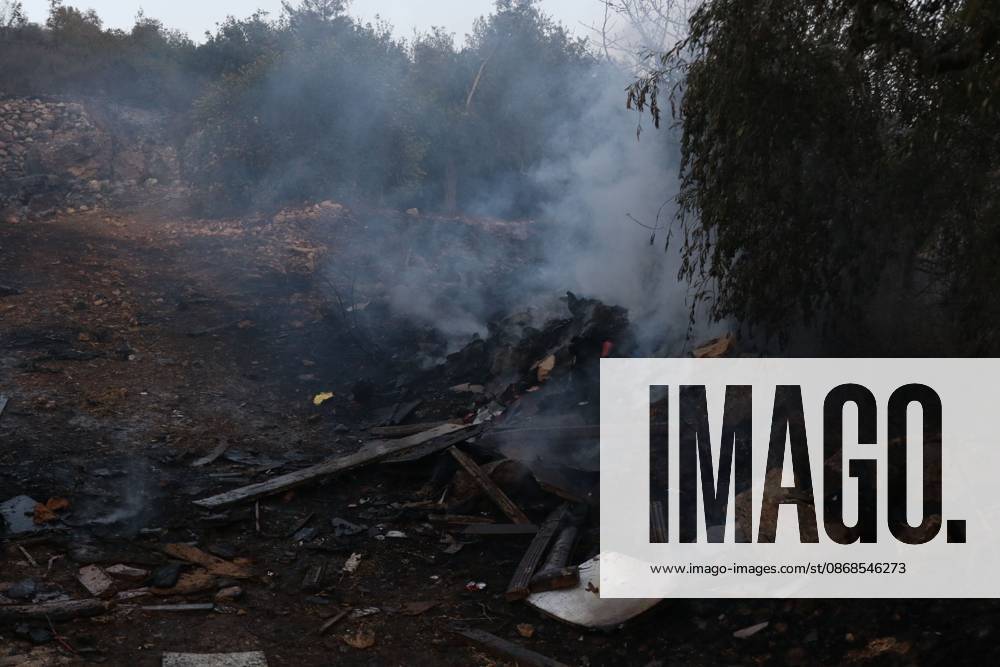 Israeli Settlers Set Fire To Olive Trees And Car Scrap Yard Near Silwad SILWAD, WEST BANK, PALESTINE OCTOBER 4, 2026: Israeli settlers set fire to olive trees and a car scrap yard between the villages of Ein Yabrud and Silwad, according to the information provided. The owner of the repair shop said more than 50 cars were destroyed in the fire. The incident occurred amid ongoing attacks targeting Palestinian property and agricultural land in the area. Fires affecting olive trees and other Palestinian property have also been reported in areas around Silwad. Ramallah Palestine, State of