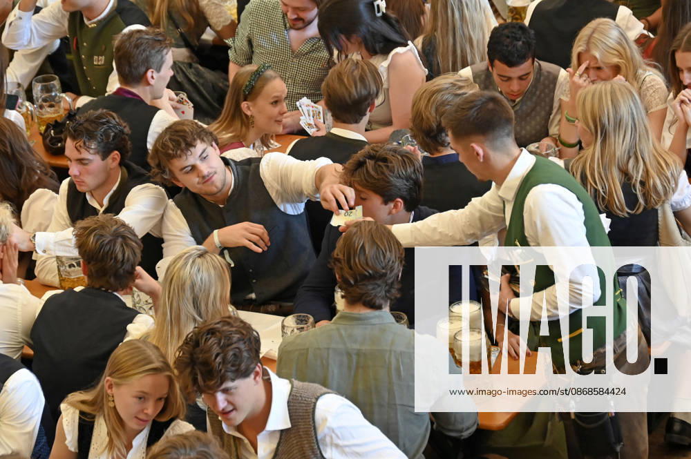 Visitors in a festival tent at the 191st Oktoberfest in 2026 at the Theresienwiese in Munich, October 4, 2026 Foto:xB.xFuturexImagex oktoberfest_6008