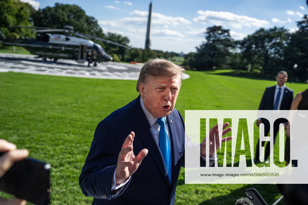 White House Departure 10 05 26 UNITED STATES - OCTOBER 5: President Donald Trump speaks with reporters on the South Lawn of the White House before boarding Marine One en route to Nebraska on Monday, October 5, 2026. (Tom Williams CQ Roll Call) Washington DC United States