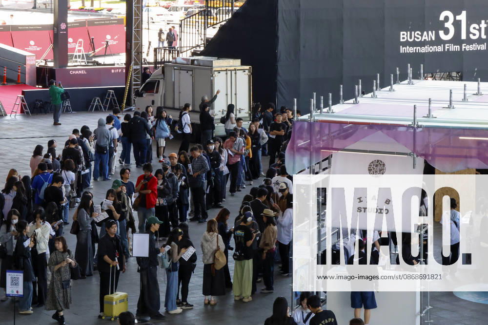 People visit the Busan International Film Festival, South Korea People wait in line outside the Busan Cinema Center, the main venue of the 31st Busan International Film Festival (BIFF), in Busan, South Korea, on October 06, 2026. Busan South Korea