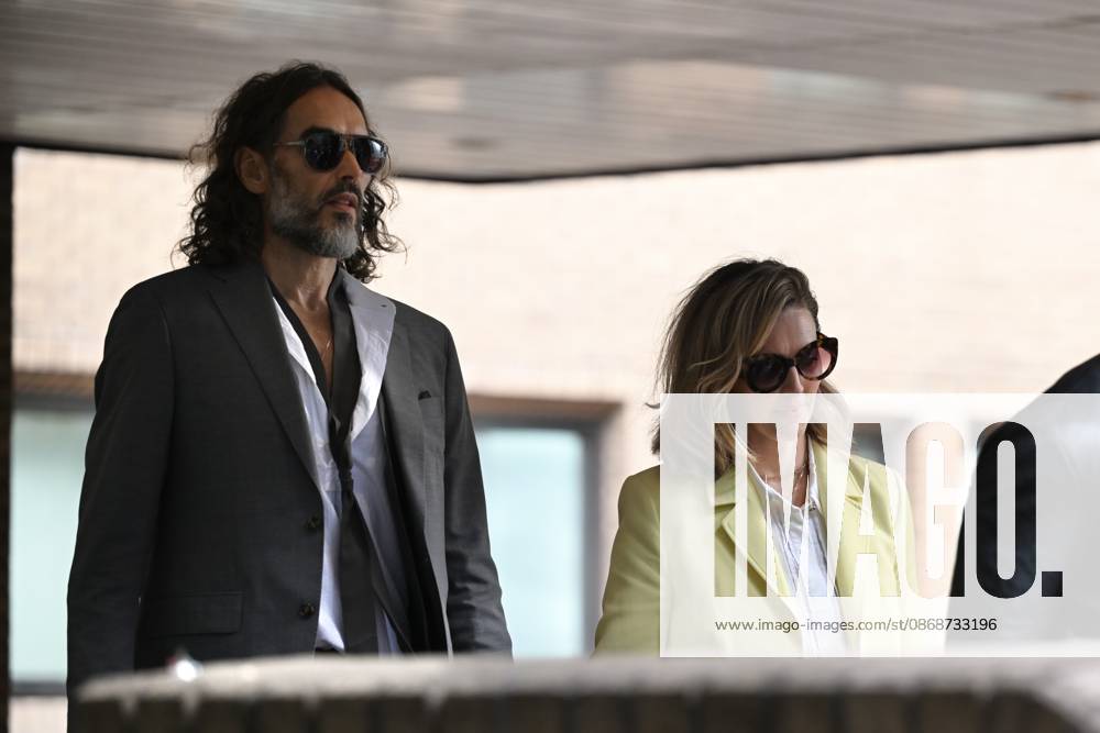 Russell Brand and his wife leave court in London LONDON, UNITED KINGDOM - OCTOBER 6: British comedian Russell Brand (L) leaves Southwark Crown Court with his wife, Laura Brand (R), following a preliminary hearing related to rape and sexual assault allegations against him in London, United Kingdom, on October 6, 2026. Rasid Necati Aslim Anadolu London United Kingdom. Editorial use only. Please get in touch for any other usage.
